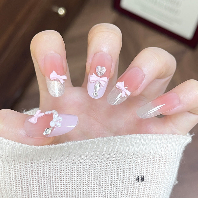 Charming Fairy Tale Pink Long Oval Press On Nail Set with Glittering Bow and Heart Accents