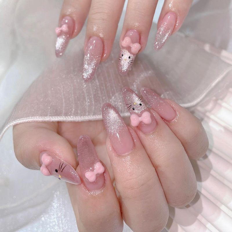 Whimsical Pink Gradient Long Almond Press On Nail Set with Glitter and Cute Bow Accents