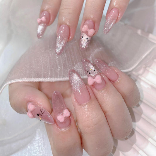 Whimsical Pink Gradient Long Almond Press On Nail Set with Glitter and Cute Bow Accents
