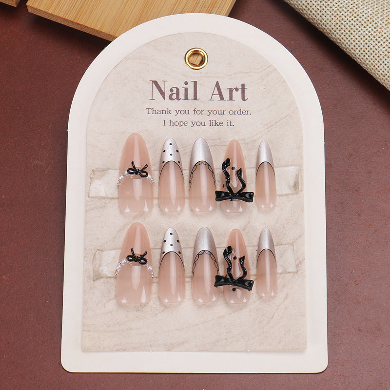 Chic Elegance Long Almond Beige with Silver Tips and Unique Bow Accents Nail Set