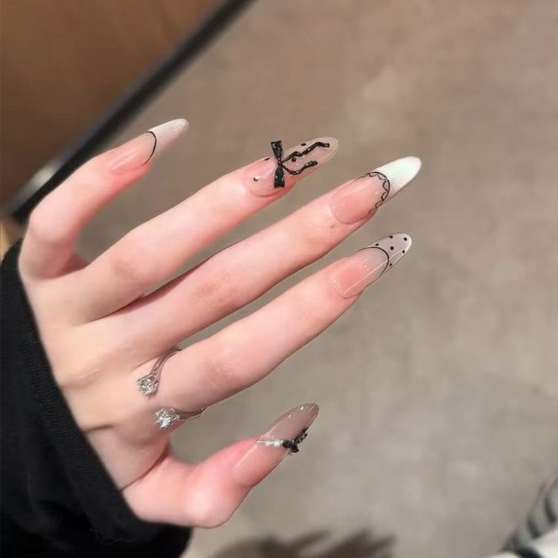 Chic Elegance Long Almond Beige with Black Accents and Elegant Bow Press On Nail Set