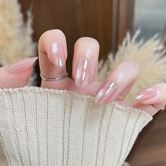Elegant Whisper Glossy Medium Oval Pink Nail Set with Reflective Finish