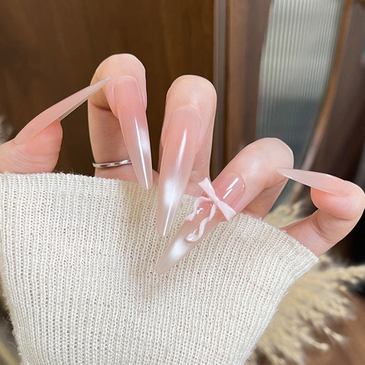 Enchanting Elegance Extra Long Stiletto Gradient Pink Press On Nail Set with Unique Artistic Design