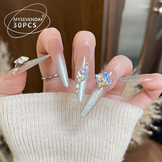 Glistening Dream Glamour Long Almond Silver Ombre Nails with Dazzling Rhinestone Accents