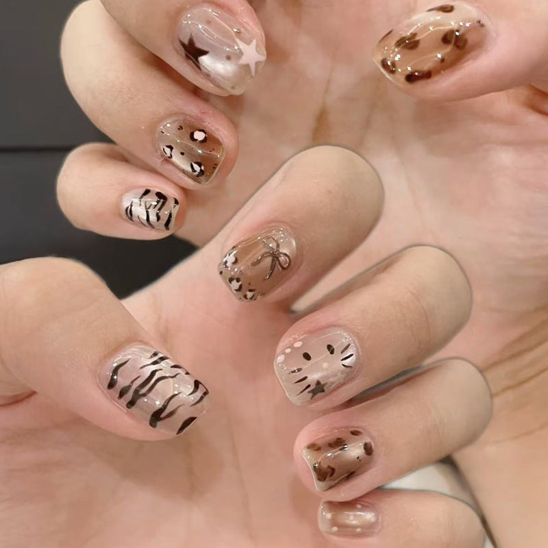 Whimsical Nature Inspired Short Square Brown Press On Nail Set with Playful Animal Prints