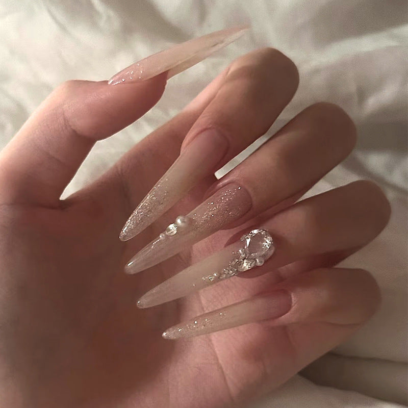 Glamorous Elegance Long Stiletto Transparent Nails with Glitter and Rhinestone Accents