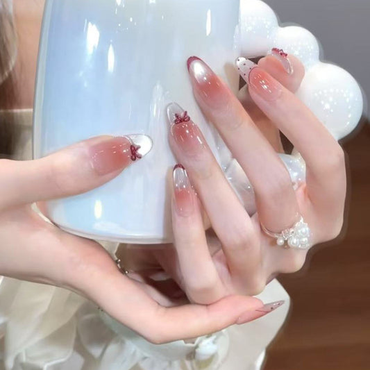 Charming Blossom Long Oval Pink Gradient Press On Nail Set with Elegant Bow Accents