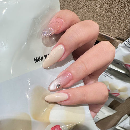 Dreamy Elegance Medium Almond Shaped Soft Beige with Glittering Accent Feature Press On Nail Set