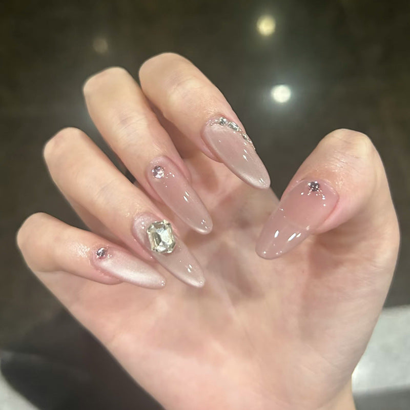 Enchanting Elegance Long Almond Shaped Soft Pink Nails with Dazzling Crystal Accents