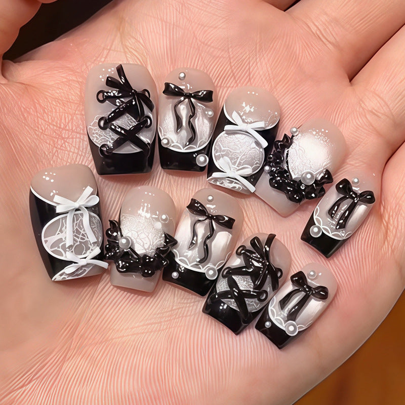 Elegant Lace Inspired Short Square Black and White Press-On Nail Set with Intricate Ribbon Detail