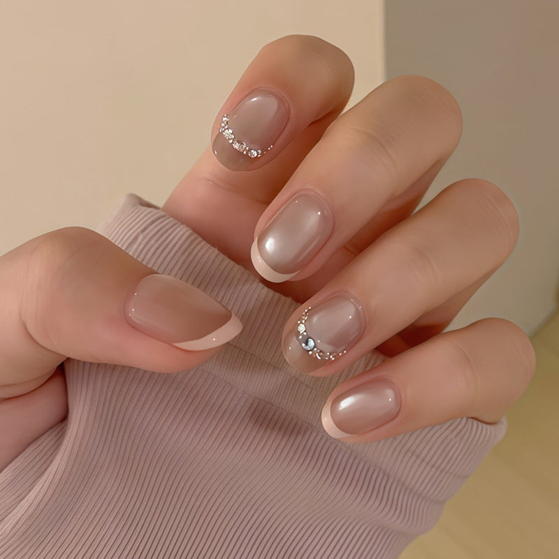 Elegant Blush Short Round Beige Nails with Sparkling Accent Gems