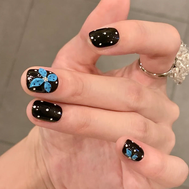 Whimsical Floral Short Square Black with Blue Petal Design Nail Set