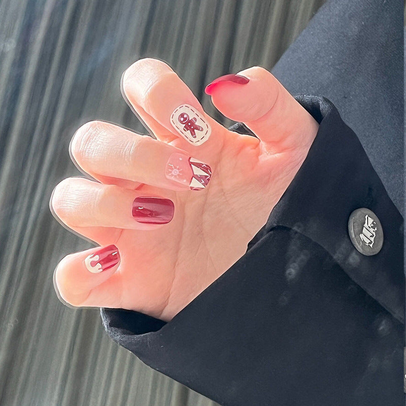 Whimsical Winter Medium Square Red and Pink Press-On Nail Set with Charming Character Design