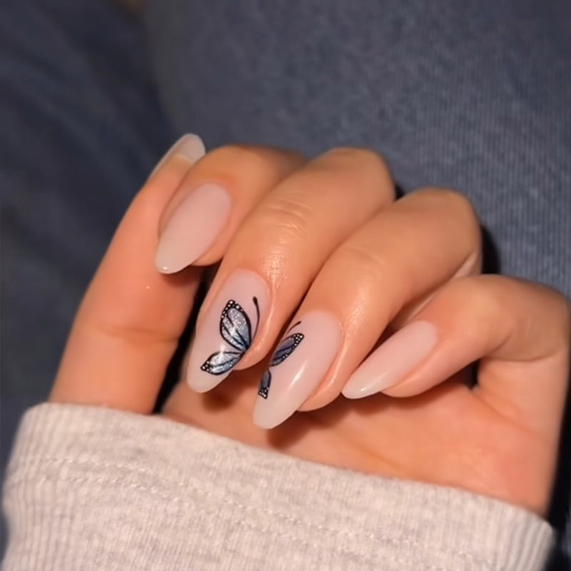 Whimsical Butterfly Inspired Medium Almond Shaped Beige Press On Nail Set with Intricate Butterfly Design