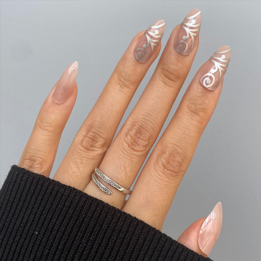 Whimsical Elegance Long Oval Neutral Beige Press-On Nail Set with Artistic Swirl Design