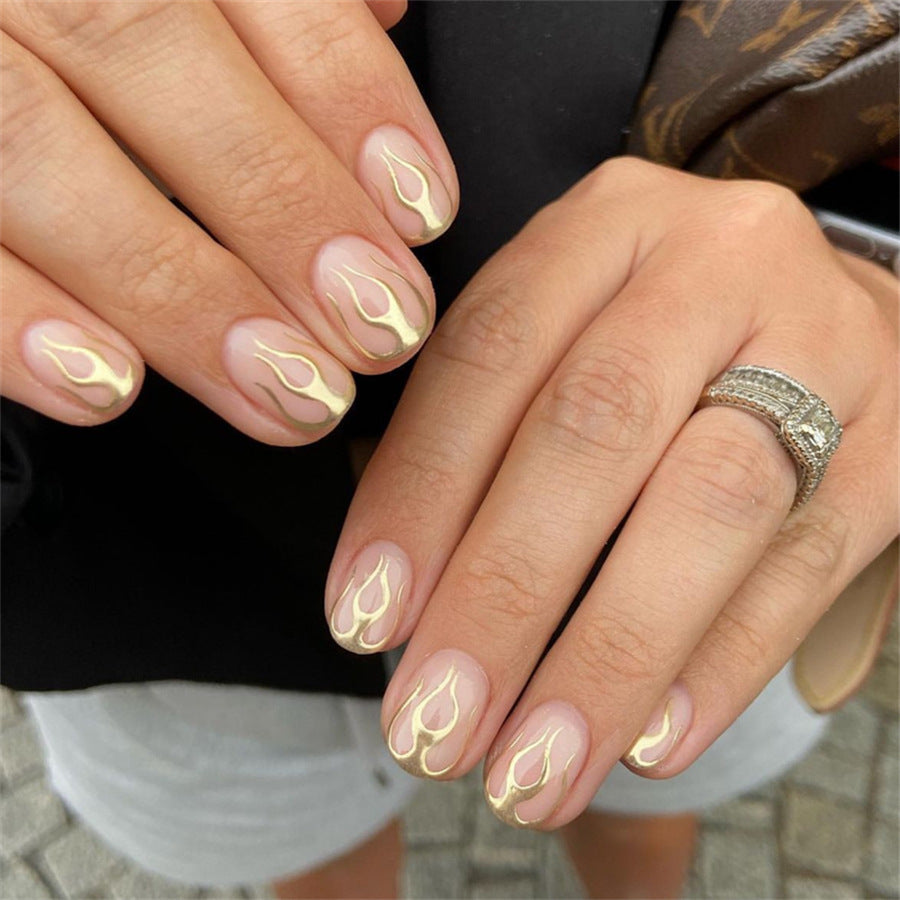 Flame Inspired Short Squoval Beige Press On Nail Set with Elegant Gold Accent Design