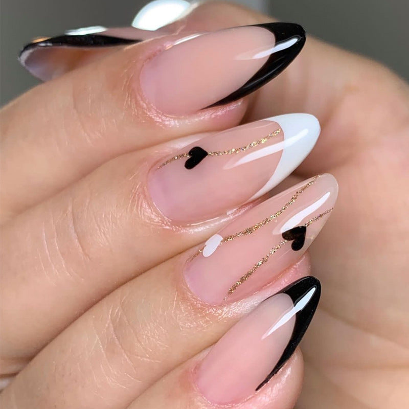 Elegant Chic Almond Shaped Long Press On Nail Set in Soft Pink with Striking Black and White with Dazzling Gold Accents