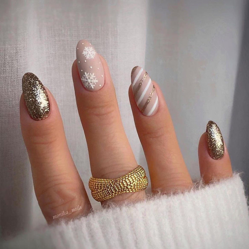Winter Wonderland Medium Almond Champagne Gold Glitter Press On Nail Set with Snowflake and Striped Design