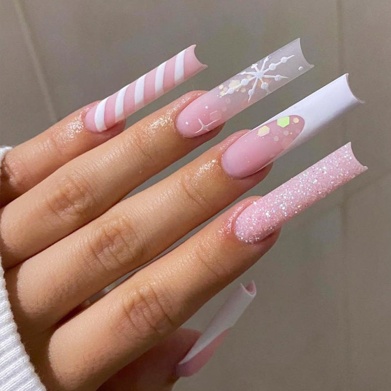 Whimsical Winter Elegance Long Square Pink Nails with Glitter and Unique Patterns
