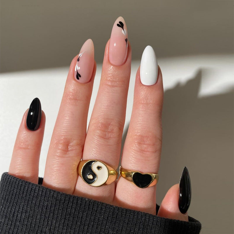 Enchanted Elegance Long Stiletto Ombre Pink and Black Glam with Unique Floral Accents Press On Nail Set