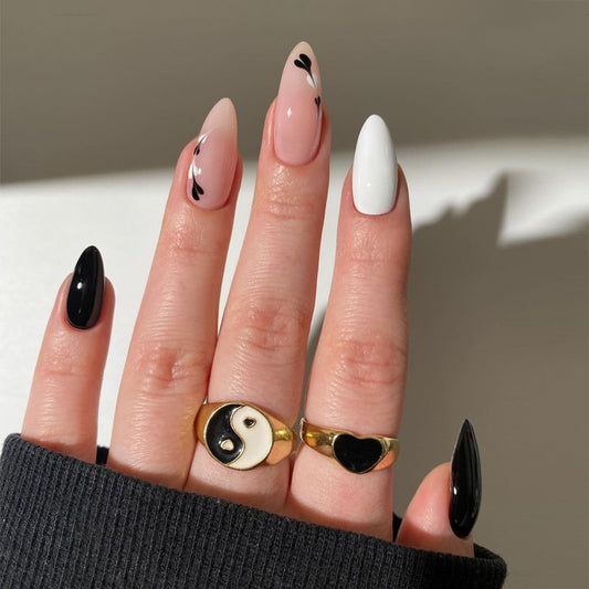 Enchanted Elegance Long Stiletto Ombre Pink and Black Glam with Unique Floral Accents Press On Nail Set