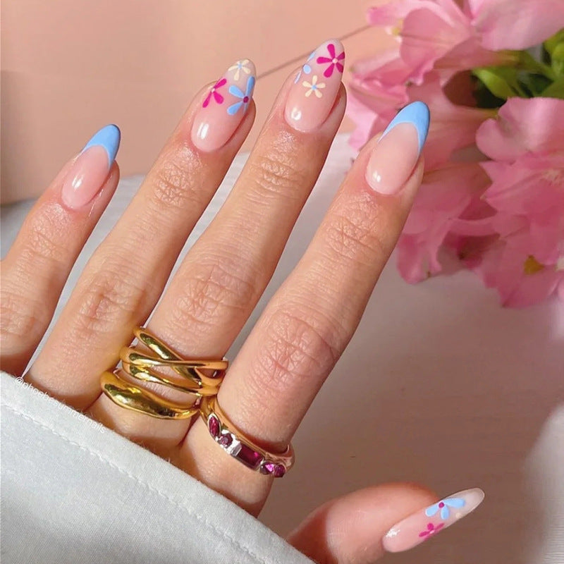 Charming Floral Fantasy Medium Almond Shaped Pastel Pink and Blue Press On Nail Set with Unique Flower Designs