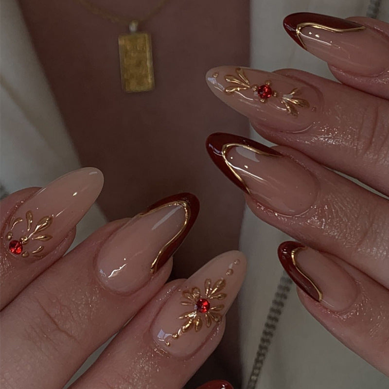 Glamorous Elegance Long Almond Shaped Beige and Burgundy Press On Nail Set with Gold Accents and Jewel Detail