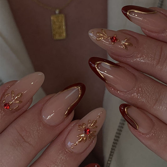 Glamorous Elegance Long Almond Shaped Beige and Burgundy Press On Nail Set with Gold Accents and Jewel Detail