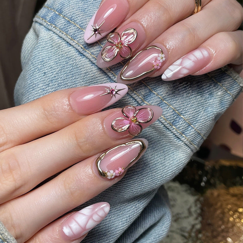 Whimsical Blossom Long Almond Pink Press on Nail Set with Floral and Gemstone Accents