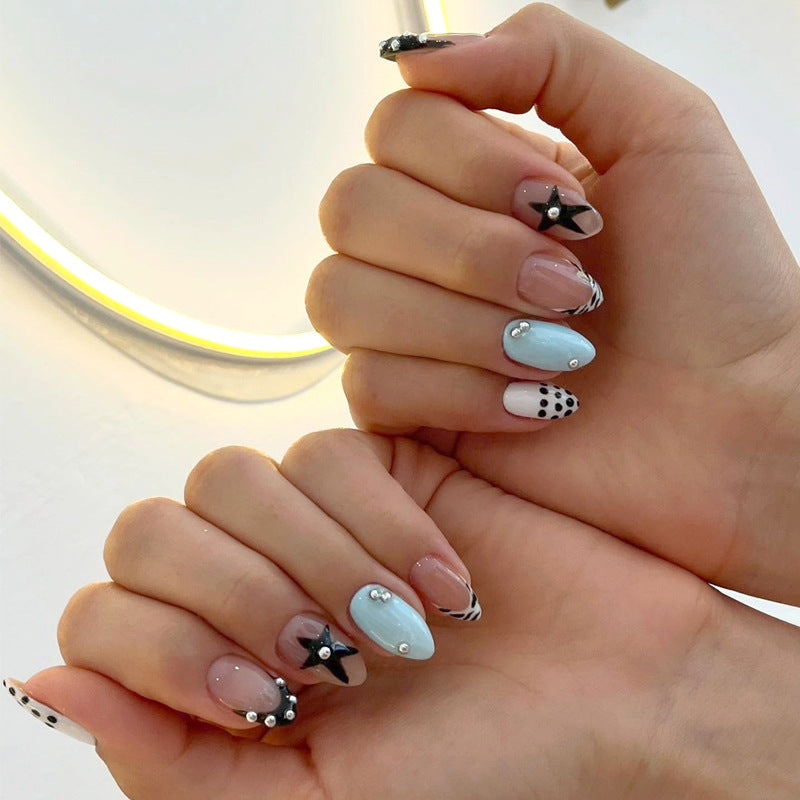 Starry Night Dreamy Medium Almond Shaped Chic Blue and Black Nail Set with Unique Gemstone Accents