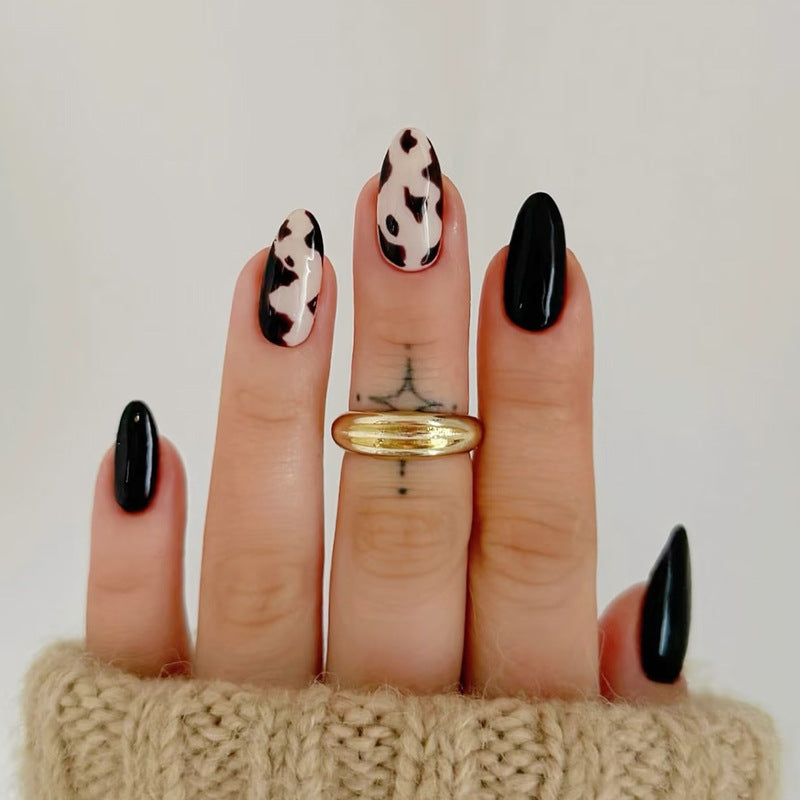 Cowgirl Chic Elegant Long Almond Black and White Glossy Nail Set with Artistic Patterns