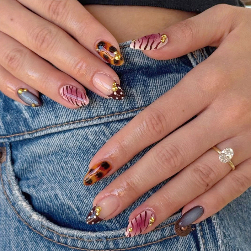 Glamorous Nature Inspired Long Almond Burgundy Brown Gray Nail Set with Unique Textured Designs and Gold Accents