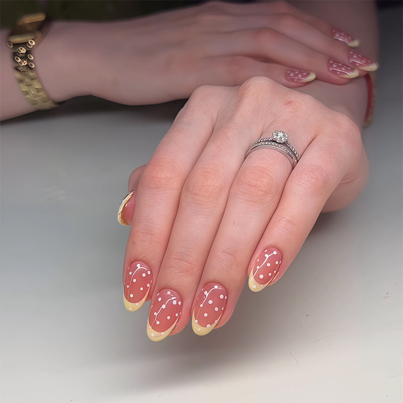 Chic Dessert Inspired Medium Oval Peach and Cream Gradient Press On Nail Set with Elegant Polka Dot Design