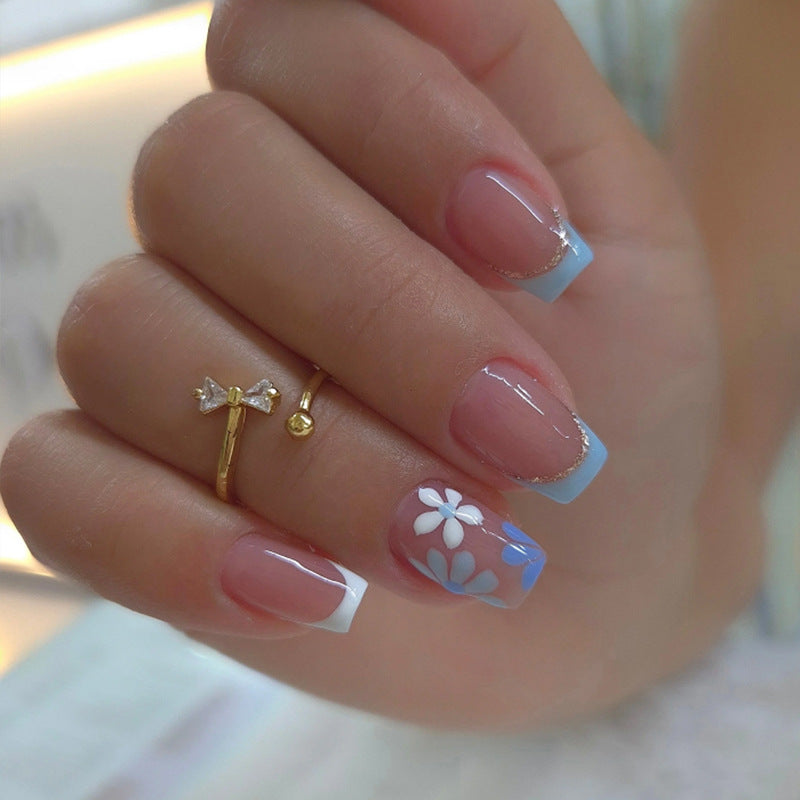 Whimsical Floral Short Square Light Blue Press On Nail Set with Delightful Flower Design