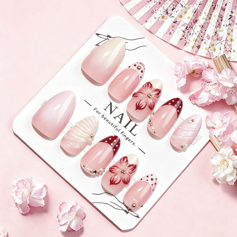 Blossom Inspired Medium Almond Pastel Nails with Floral Accents