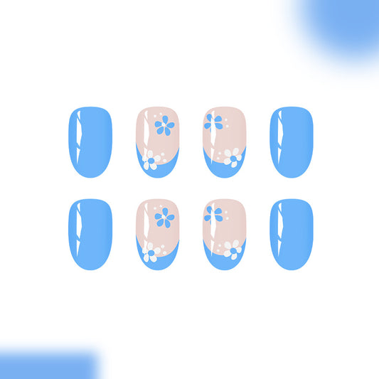 Serene Skies Medium Almond Blue Nails with Charming Floral Accents