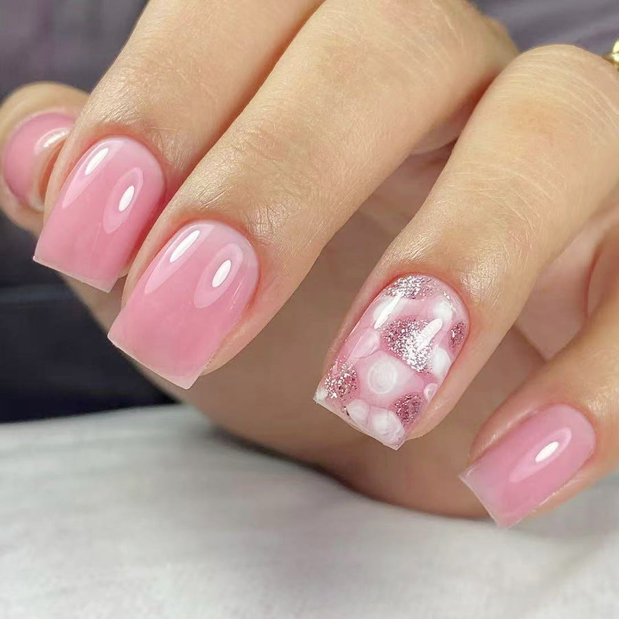 Enchanting Elegance Short Square Pink Press On Nail Set with Glitter Accent Design