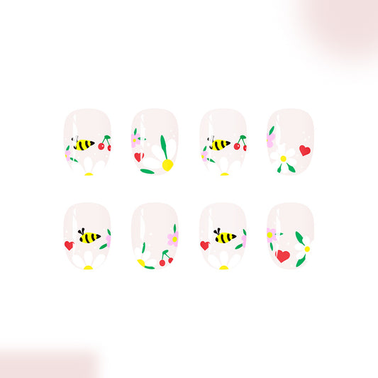 Bee Inspired Floral Short Round Press on Nail Set in Soft Pink Featuring Charming Hand Painted Designs