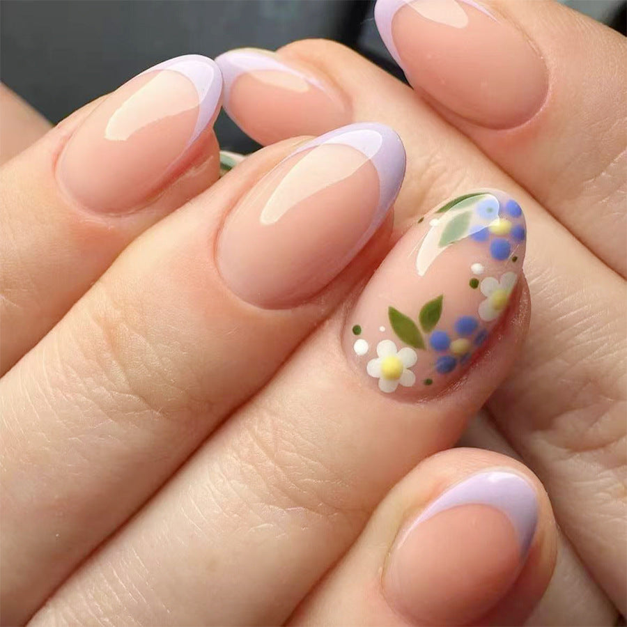 Whimsical Floral Elegance Short Oval Soft Pink with Lavender French Tips and Artful Botanical Accents Press On Nail Set