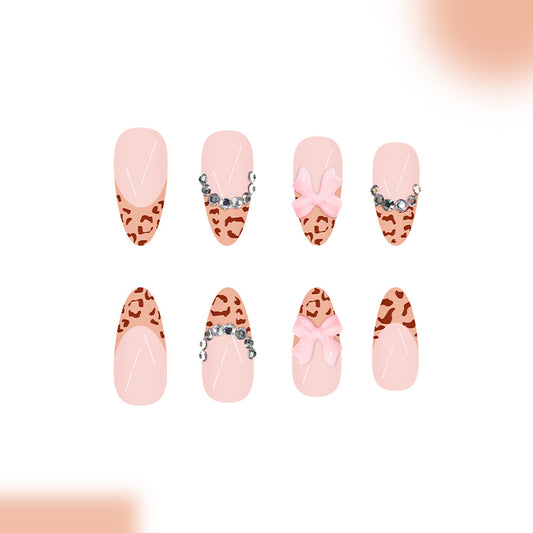 Wild Safari Pink Long Almond Press-on Nail Set with Leopard Print and Sparkling Accessories