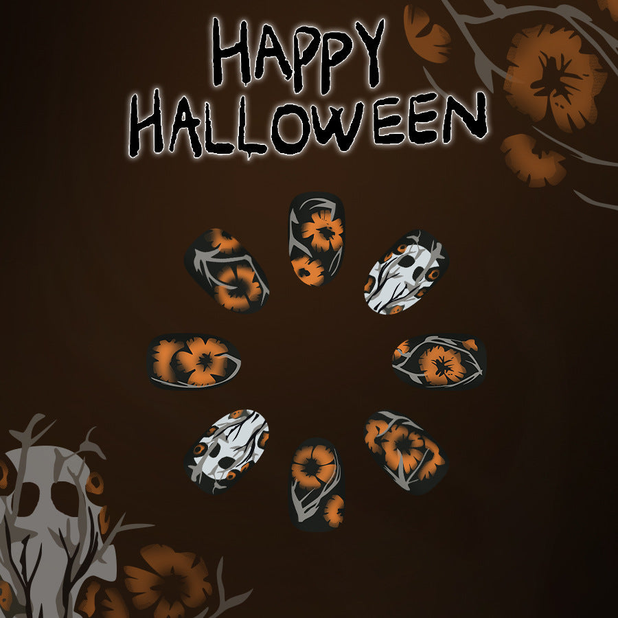 Spooky Halloween Medium Oval Black and Orange Floral Press on Nail Set with Unique Skull Design