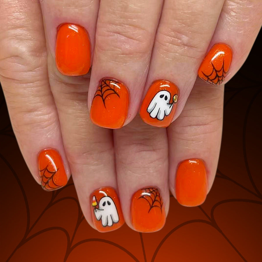 Spooktacular Orange Short Square Press On Nail Set Featuring Adorable Ghost and Spider Designs