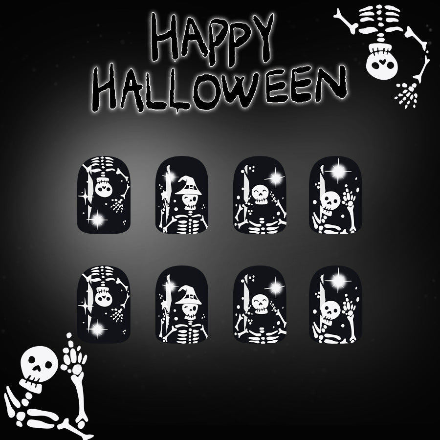 Spooky Halloween Themed Short Square Black Press On Nail Set Featuring Whimsical Skeleton Designs