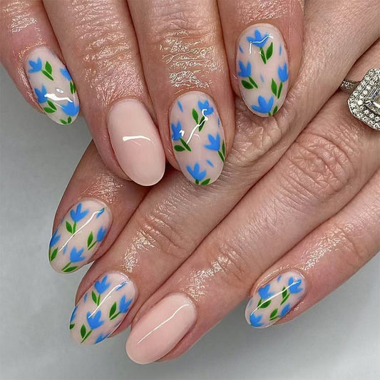 Whimsical Spring Floral Medium Oval Press On Nail Set in Pastel Blue with Artisan Flower Design
