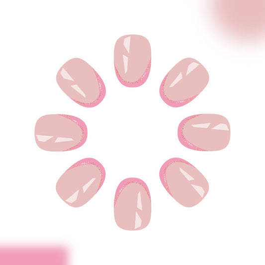Whimsical Elegance Press On Nail Set in Medium Oval Blush Pink with Sparkling Edges