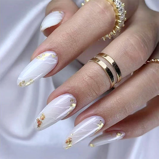 Ethereal Elegance Long Almond Shaped White Nails with Gold Foil Accents