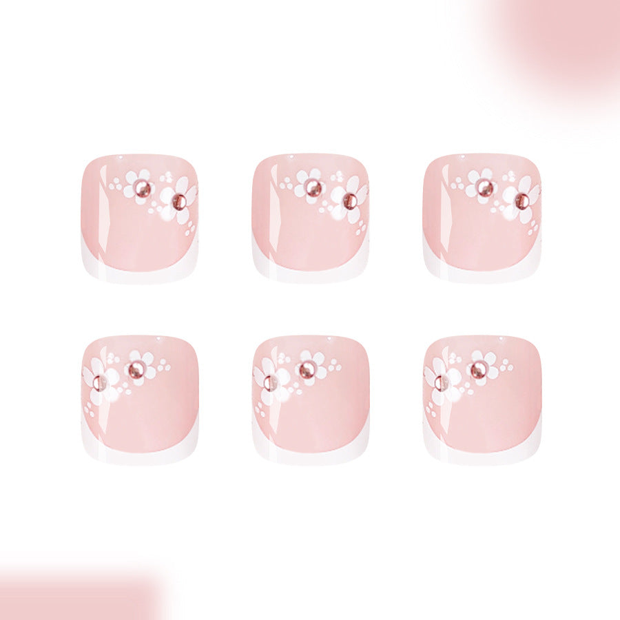Blossom Garden Short Square Pink Press-On Toenail Set Featuring Floral Accents and Sparkling Gems