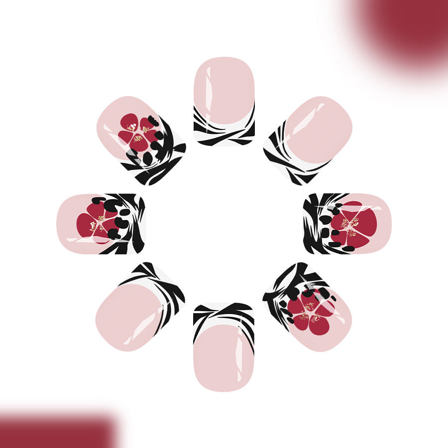 Chic Floral Dream Medium Square Press On Nail Set in Soft Pink with Bold Black and Red Floral Design