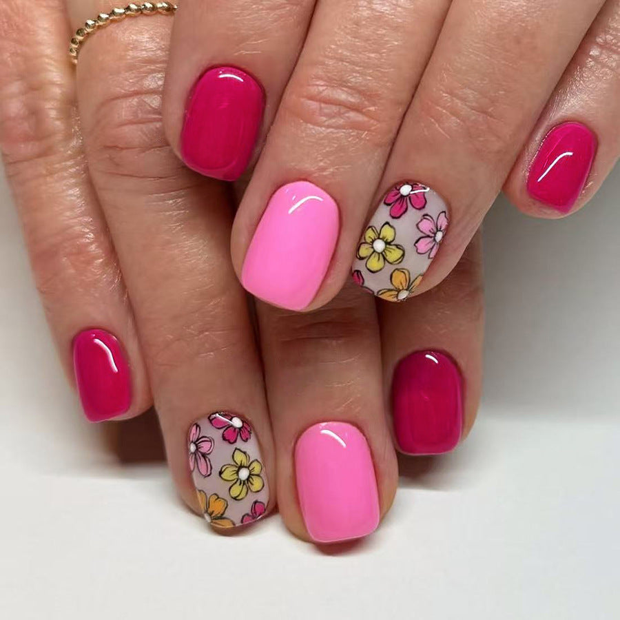 Blossom Dream Short Square vibrant pink with floral accent nails