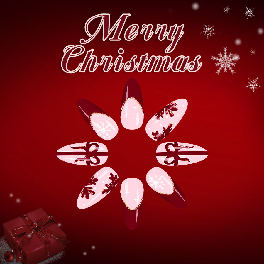 Festive Glamour Long Almond Burgundy and Pink Nails with Snowflake and Ribbon Accents